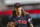 Cleveland Indians pitcher Mike Clevinger leaves the game against the Minnesota Twins during a baseball game Sunday, Sept. 8, 2019 in Minneapolis. (AP Photo/Andy Clayton-King)