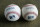 In this May 7, 2019 photo, the new official Triple-A league baseball, left, is seen beside a baseball from the previous year. The new ball is the same as the big-league ball, it is said to be harder, more tightly wound at its core and with slightly lower seams, all of which make it more aerodynamic than the ball used at the Double-A level and lower and previously in Triple-A. As of May 8, 2019, home runs in Triple A were up 64 percent over a comparable period in 2018 (1,202 homers vs. 732), according to figures MLB provided to The Associated Press. (AP Photo/Nati Harnik)
