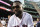 BOSTON, MA - SEPTEMBER 9: Former designated hitter David Ortiz #34 of the Boston Red Sox reacts after throwing out a ceremonial first pitch as he returns to Fenway Park before a game against the New York Yankees on September 9, 2019 at Fenway Park in Boston, Massachusetts. (Photo by Billie Weiss/Boston Red Sox/Getty Images)