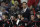 Carolina Hurricanes coach Rod Brind'Amour speaks with his players during the second period of an NHL hockey game against the New York Rangers in Raleigh, N.C., Friday, Feb. 21, 2020. (AP Photo/Gerry Broome)