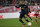 Arsenal's French striker Alexandre Lacazette watches the ball as he prepares to shoot to open the scoring during the UEFA Europa League round of 32 first leg football match between Olympiakos and Arsenal at the Karaiskakis Stadium in Piraeus, near Athens, on February 20, 2020. - Arsenal won the game 1-0. (Photo by LOUISA GOULIAMAKI / AFP) (Photo by LOUISA GOULIAMAKI/AFP via Getty Images)