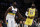New Orleans Pelicans' Zion Williamson (1) looks on from under the basket during free throws next to Los Angeles Lakers' LeBron James (23) during the first half of an NBA basketball game Tuesday, Feb. 25, 2020, in Los Angeles. (AP Photo/Marcio Jose Sanchez)