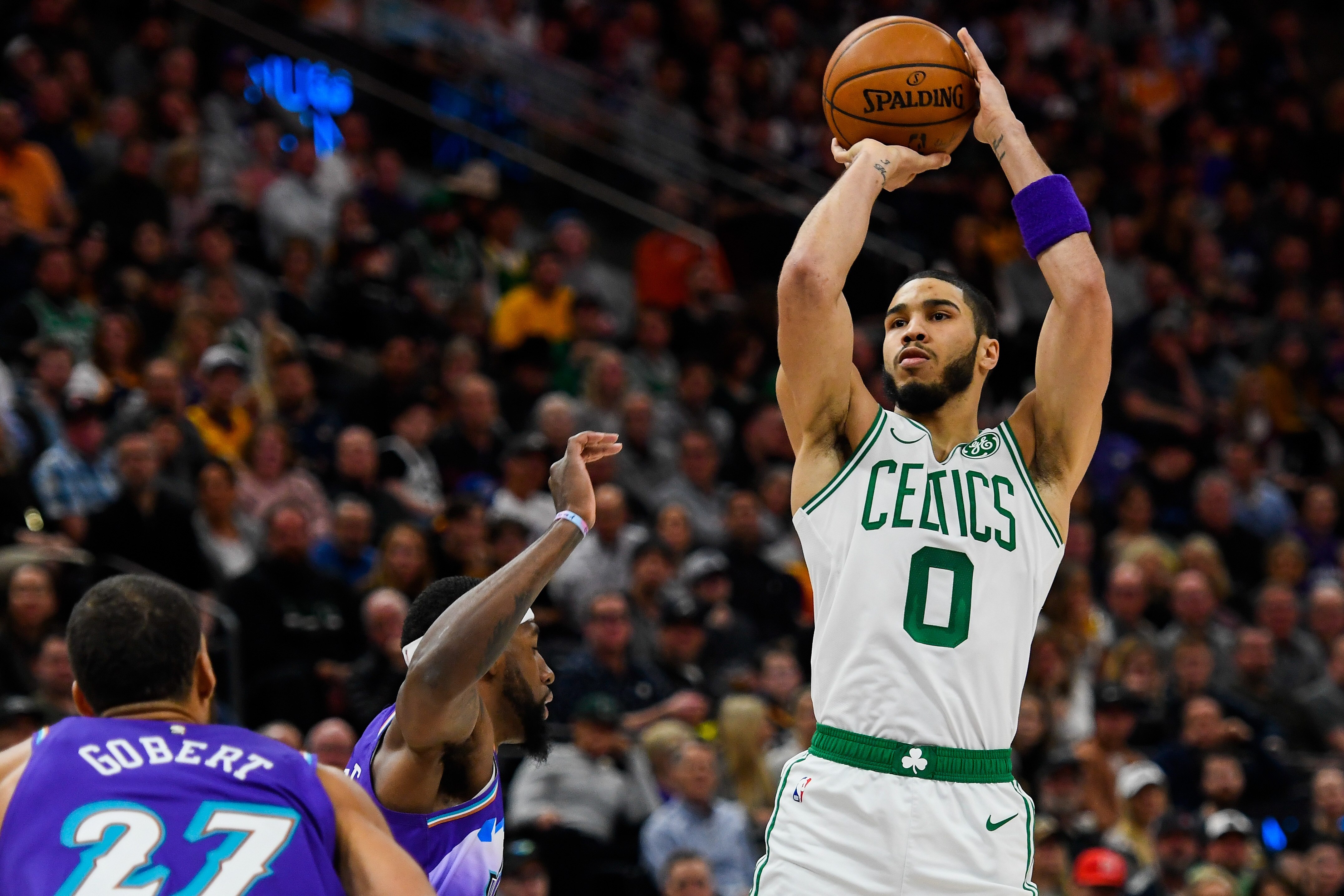 SALT LAKE CITY, UT - FEBRUARY 26: Jayson Tatum #0 of the Boston Celtics attempts a shot over Royce O'Neale #23 of the Utah Jazz during a game at Vivint Smart Home Arena on February 26, 2020 in Salt Lake City, Utah. NOTE TO USER: User expressly acknowledges and agrees that, by downloading and/or using this photograph, user is consenting to the terms and conditions of the Getty Images License Agreement. (Photo by Alex Goodlett/Getty Images)