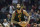 FILE - In this Feb. 12, 2020, file photo, Cleveland Cavaliers' Andre Drummond plays against the Atlanta Hawks in the first half of an NBA basketball gamein Cleveland. General manager Koby Altman wasn't necessarily in the market for another front court player, not with Tristan Thompson, Kevin Love and Larry Nance Jr. already on the roster. But he said the chance to add a player of Drummond's caliber, a versatile, rebounding machine and proven veteran who will make the Cavs' younger players better immediately and perhaps in the future, was too enticing.(AP Photo/Tony Dejak, File)