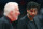 WASHINGTON, DC - NOVEMBER 20: Assistant coach Tim Duncan (R) looks on as head coach Gregg Popovich of the San Antonio Spurs talks with an official in the first half against the Washington Wizards at Capital One Arena on November 20, 2019 in Washington, DC.  NOTE TO USER: User expressly acknowledges and agrees that, by downloading and/or using this photograph, user is consenting to the terms and conditions of the Getty Images License Agreement.  (Photo by Rob Carr/Getty Images)