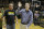 Dave Speidel, left, watches as he son Josh Speidel, right, is introduced with the Vermont players before an NCAA college basketball game against Purdue in West Lafayette, Ind., Sunday, Nov. 15, 2015. Speidel is recovering from a Feb. 1 auto accident that resulted in a traumatic brain injury.  (AP Photo/Michael Conroy)