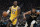 Los Angeles Lakers' LeBron James dribbles past Milwaukee Bucks' Giannis Antetokounmpo during the first half of an NBA basketball game Thursday, Dec. 19, 2019, in Milwaukee. (AP Photo/Morry Gash)