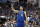 Dallas Mavericks' Dirk Nowitzki celebrates a teammate's basket during the second half of an NBA basketball game against the Phoenix Suns in Dallas, Tuesday, April 9, 2019. (AP Photo/Tony Gutierrez)