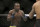 Abdul Razak Alhassan, left, stalks Sabah Homasi during a mixed martial arts bout at UFC 220, Saturday, January 20, 2018, in Boston. Alhassan won via 1st round knockout. (AP Photo/Gregory Payan)