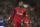 Liverpool's Divock Origi celebrates his second goal against Everton during the English Premier League soccer match between Liverpool and Everton at Anfield Stadium, Liverpool, England, Wednesday, Dec. 4, 2019. (AP Photo/Jon Super)