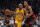 Los Angeles Lakers forward Kobe Bryant, left, drives past Toronto Raptors guard DeMar DeRozan during the second half of an NBA basketball game, Friday, Nov. 20, 2015, in Los Angeles. The Raptors won 102-91. (AP Photo/Mark J. Terrill)