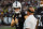 OAKLAND, CA - NOVEMBER 17: Quarterback Derek Carr #4 of the Oakland Raiders talks to head coach Jon Gruden on the sidelines during the fourth quarter against the Cincinnati Bengals at RingCentral Coliseum on November 17, 2019 in Oakland, California. The Oakland Raiders defeated the Cincinnati Bengals 17-10. (Photo by Jason O. Watson/Getty Images)