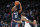 New York Knicks guard Damyean Dotson (21) goes up for a 3-point shot as Washington Wizards guard Gary Payton II (20) watches during the second half of an NBA basketball game in New York, Monday, Dec. 23, 2019. The Wizards won 121-115. (AP Photo/Kathy Willens)