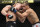 Petr Yan, left, fights Urijah Faber in a mixed martial arts bantamweight bout at UFC 245, Saturday, Dec. 14, 2019, in Las Vegas. (AP Photo/John Locher)