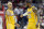 Los Angeles Lakers forwards Kyle Kuzma (0) and LeBron James (23) celebrate the team's impending win over the Houston Rockets, in the final minute of an NBA basketball game Saturday, Jan. 18, 2020, in Houston. (AP Photo/Michael Wyke)