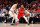 PORTLAND, OREGON - MARCH 10: Carmelo Anthony #00 of the Portland Trail Blazers (R) moves the ball against Dario Saric #20 of the Phoenix Suns during the second half of the game at the Moda Center on March 10, 2020 in Portland, Oregon. The Portland Trail Blazers topped the Phoenix Suns, 121-105. NOTE TO USER: User expressly acknowledges and agrees that, by downloading and or using this photograph, User is consenting to the terms and conditions of the Getty Images License Agreement. (Photo by Alika Jenner/Getty Images)