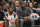 Washington Wizards guard Bradley Beal, left, and guard John Wall, right, watch from the bench during the second half of an NBA basketball game against the Milwaukee Bucks, Monday, Feb. 24, 2020, in Washington. The Bucks won 137-134 in overtime. (AP Photo/Nick Wass)