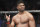 Alistair Overeem celebrates after defeating Mark Hunt during a heavyweight mixed martial arts bout at UFC 209, Saturday, March 4, 2017, in Las Vegas. (AP Photo/John Locher)