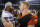 Dallas Cowboys quarterback Dak Prescott (4) and Cincinnati Bengals quarterback Andy Dalton, right, embrace following a preseason NFL football game between the Cincinnati Bengals and the Dallas Cowboys in Arlington, Texas, Saturday, Aug. 18, 2018. (AP Photo/Ron Jenkins)