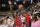 The Chicago Bulls Michael Jordan celebrates after the Bulls beat the Phoenix Suns 99-98 to win their third consecutive NBA title in Phoenix, June 20, 1993. Jordan scored 33 points and now holds the record for the highest scoring average in finals history, 41.0, eclipsing Rick Barry's 1967 standard of 40.8. (AP Photo/John Swart)