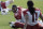 Arizona Cardinals wide receivers Anquan Boldin, left, and Larry Fitzgerald, right, chat while stretching out during football practice Saturday, Jan. 24, 2009, at the team's practice facility in Tempe, Ariz. The Cardinals will play the Pittsburgh Steelers in Super Bowl XLIII in Tampa on Feb. 1. (AP Photo/Paul Connors)