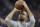 San Antonio Spurs guard Tony Parker warms before an NBA basketball game against the Indiana Pacers, Sunday, Jan. 21, 2018, in San Antonio. (AP Photo/Eric Gay)