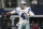 FILE - In this Dec. 15, 2019, file photo, Dallas Cowboys quarterback Dak Prescott looks to throw against the Washington Redskins during the first half of an NFL football game in Arlington, Texas.   The Cowboys continue to play the waiting game with their free agents. With the current collective bargaining agreement still in place and uncertainty whether a new one will be in force before the new league season begins next month, negotiations between Cowboys executive vice president Stephen Jones and Prescott have gone nowhere. (AP Photo/Ron Jenkins, File)