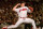 FILE - In this Oct. 9, 1998, file photo, Cleveland Indians pitcher Bartolo Colon delivers a pitch against the New York Yankees in the first inning of Game 3 of the American League championship series in Cleveland. Colon turns 42 on Sunday, and in his 18th year in the major leagues, the Dominican is showing pinpoint accuracy and an uncanny ability to get outs with one pitch: a low-90’s fastball. (AP Photo/Beth A. Keiser, File)