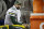 Aaron Rodgers, quarterback de los Packers de Green Bay, se sienta en el banquillo durante la segunda mitad de la final de la Conferencia Nacional ante los 49ers de San Francisco, el domingo 19 de enero de 2020, en Santa Clara, California (AP Foto/Ben Margot)