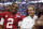 Alabama quarterback Jalen Hurts and Alabama head coach Nick Saban stand with the Leather Helmet trophy after an NCAA football game against Florida State, Saturday, Sept. 2, 2017, in Atlanta. Alabama won 24-7. (AP Photo/John Bazemore)