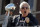 New England Patriots owner Robert Kraft yells to fans during their victory parade through downtown Boston, Tuesday, Feb. 5, 2019, to celebrate their win over the Los Angeles Rams in Sunday's NFL Super Bowl 53 football game in Atlanta. The Patriots have won six Super Bowl championships. (AP Photo/Elise Amendola)