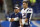 New England Patriots quarterback Tom Brady (12) stands next to offensive coordinator Josh McDaniels during pregame of an NFL football game, Thursday, Aug. 8, 2019, in Detroit. (AP Photo/Paul Sancya)