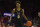 FILE - In this March 7, 2020, file photo, Washington forward Jaden McDaniels (0) is shown during the first half of an NCAA college basketball game against Arizona in Tucson, Ariz. McDaniels has declared for the NBA draft. McDaniels is the latest one-and-done player for the Huskies and is projected as a middle of the first-round pick. (AP Photo/Rick Scuteri, File)