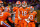 NEW ORLEANS, LOUISIANA - JANUARY 13: K.J. Henry #5, left, congratulates Trevor Lawrence #16, Amari Rodgers #3, rear, after Tee Higgins #5 of the Clemson Tigers 36-yard touchdown run during the second quarter of the College Football Playoff National Championship game against the LSU Tigers at the Mercedes Benz Superdome on January 13, 2020 in New Orleans, Louisiana. The LSU Tigers topped the Clemson Tigers, 42-25. (Photo by Alika Jenner/Getty Images)