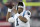 Carolina Panthers quarterback Cam Newton warms up before an NFL preseason football game against the New England Patriots, Thursday, Aug. 22, 2019, in Foxborough, Mass. (AP Photo/Charles Krupa)