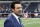 CBS football analyst Tony Romo walks across the field during warm ups before an NFL football game between the Kansas City Chiefs and Dallas Cowboys on Sunday, Nov. 5, 2017, in Arlington, Texas. (AP Photo/Michael Ainsworth)