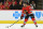 CHICAGO, ILLINOIS - OCTOBER 22:  Alex DeBrincat #12 of the Chicago Blackhawks controls the puck during the second period against the Vegas Golden Knights at the United Center on October 22, 2019 in Chicago, Illinois. (Photo by Stacy Revere/Getty Images)