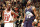 (FILES) In this 07 June 1998 file photo, Michael Jordan (L) of the Chicago Bulls smiles while standing next to Karl Malone of the Utah Jazz 07 June in the first half of game three of the NBA Finals at the United Center in Chicago, IL. Print and broadcast reports of 12 January indicate that Jordan, a five-time NBA Most Valuable Player, plans to announce his retirement at a 13 January news conference in Chicago.        AFP PHOTOFILES/Jeff HAYNES (Photo by JEFF HAYNES / AFP) (Photo by JEFF HAYNES/AFP via Getty Images)