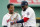 Boston Red Sox's David Ortiz, right, jokes with former teammate Pedro Martinez during ceremonies before a baseball game against the Toronto Blue Jays in Boston, Sunday, Oct. 2, 2016. (AP Photo/Michael Dwyer)