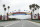 FILE - In this Monday, March 16, 2020, file photo, the road to the entrance of Walt Disney World has few cars, in Lake Buena Vista, Fla. Two more unions have reached agreements with Walt Disney World over furloughs caused by the theme park resort's closure during the new coronavirus outbreak. The agreements reached late Friday, April 10, apply to security guards and workers involved in facilities and operations. (AP Photo/John Raoux, File)