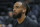 Utah Jazz guard Mike Conley warms up during practice before the start of their NBA basketball game against the Phoenix Suns Monday, Feb. 24, 2020, in Salt Lake City. (AP Photo/Rick Bowmer)
