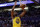 Golden State Warriors forward Kevon Looney (5) dunks during the first half of an NBA basketball game against the Phoenix Suns Saturday, Feb. 29, 2020, in Phoenix. (AP Photo/Matt York)