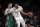 Los Angeles Lakers' Anthony Davis (3) is defended by Boston Celtics' Gordon Hayward during the first half of an NBA basketball game Sunday, Feb. 23, 2020, in Los Angeles. (AP Photo/Marcio Jose Sanchez)