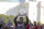 Washington Nationals coach Dave Martinez rises the trophy to celebrates the World Series baseball championship during a rally following the parade to celebrate the team's World Series baseball championship over Houston Astros, Saturday, Nov. 2, 2019, in Washington. (AP Photo/Jose Luis Magana)