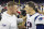 HOUSTON, TX - DECEMBER 1:  J.J. Watt #99 of the Houston Texans talks after the game on the field while surrounded by photographers to Tom Brady #12 of the New England Patriots at NRG Stadium on December 1, 2019 in Houston, Texas.  The Texans defeated the Patriots 28-22.  (Photo by Wesley Hitt/Getty Images)