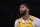 Los Angeles Lakers forward Anthony Davis stands on the court during the second half of an NBA basketball game against the Memphis Grizzlies Friday, Feb. 21, 2020, in Los Angeles. The Lakers won 117-105. (AP Photo/Mark J. Terrill)