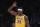 Los Angeles Lakers center Dwight Howard gestures during the first half of an NBA basketball game against the Philadelphia 76ers Tuesday, March 3, 2020, in Los Angeles. (AP Photo/Mark J. Terrill)
