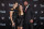 IMAGE DISTRIBUTED FOR WWE - WWE Chief Brand Officer Stephanie McMahon, left, Ronda Rousey, center, and WWE EVP of Talent, Live Events and Creative Paul