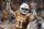 Texas quarterback Sam Ehlinger (11) during the first half of the Alamo Bowl NCAA college football game against Utah in San Antonio, Tuesday, Dec. 31, 2019. (AP Photo/Austin Gay)
