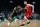 Boston Celtics' Kyrie Irving (11) drives past Houston Rockets' Austin Rivers (25) during the first half of an NBA basketball game in Boston, Sunday, March 3, 2019. (AP Photo/Michael Dwyer)